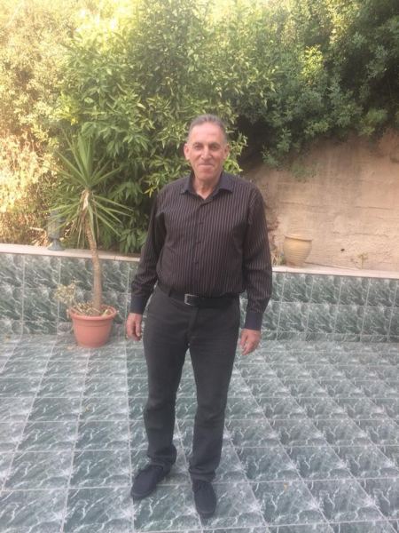 د. عامر جنداوي في مجموعته الشعرية "وعودٌ ليسَ أكثر" 